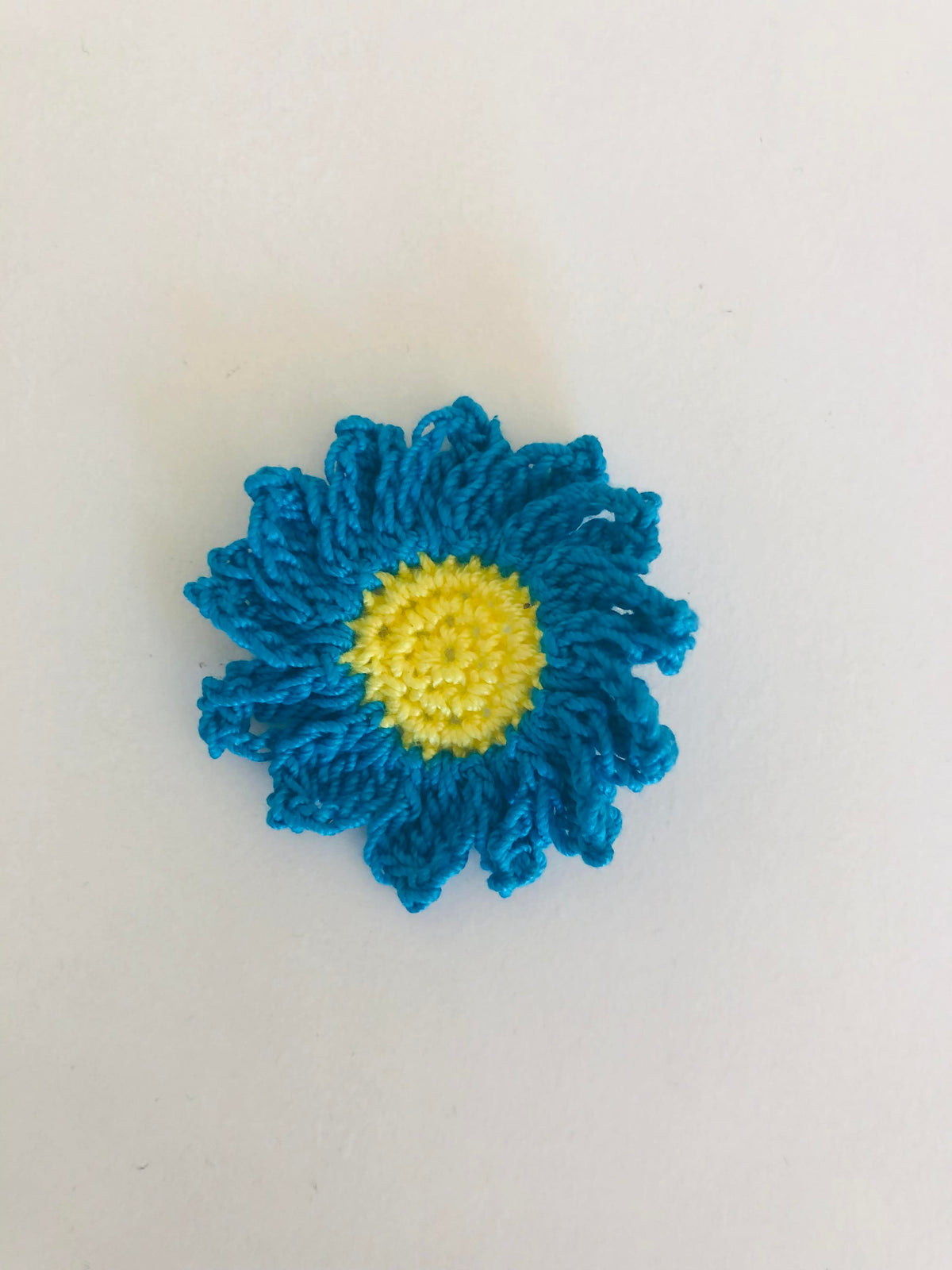 Blue flower pin